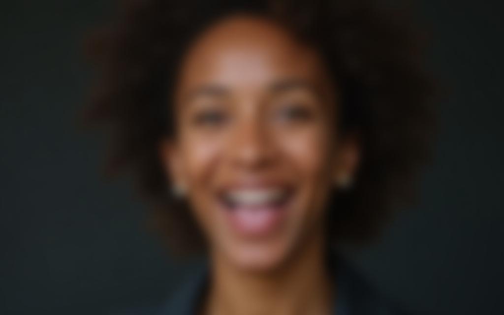 Speaker with an engaging and animated facial expression, conveying enthusiasm